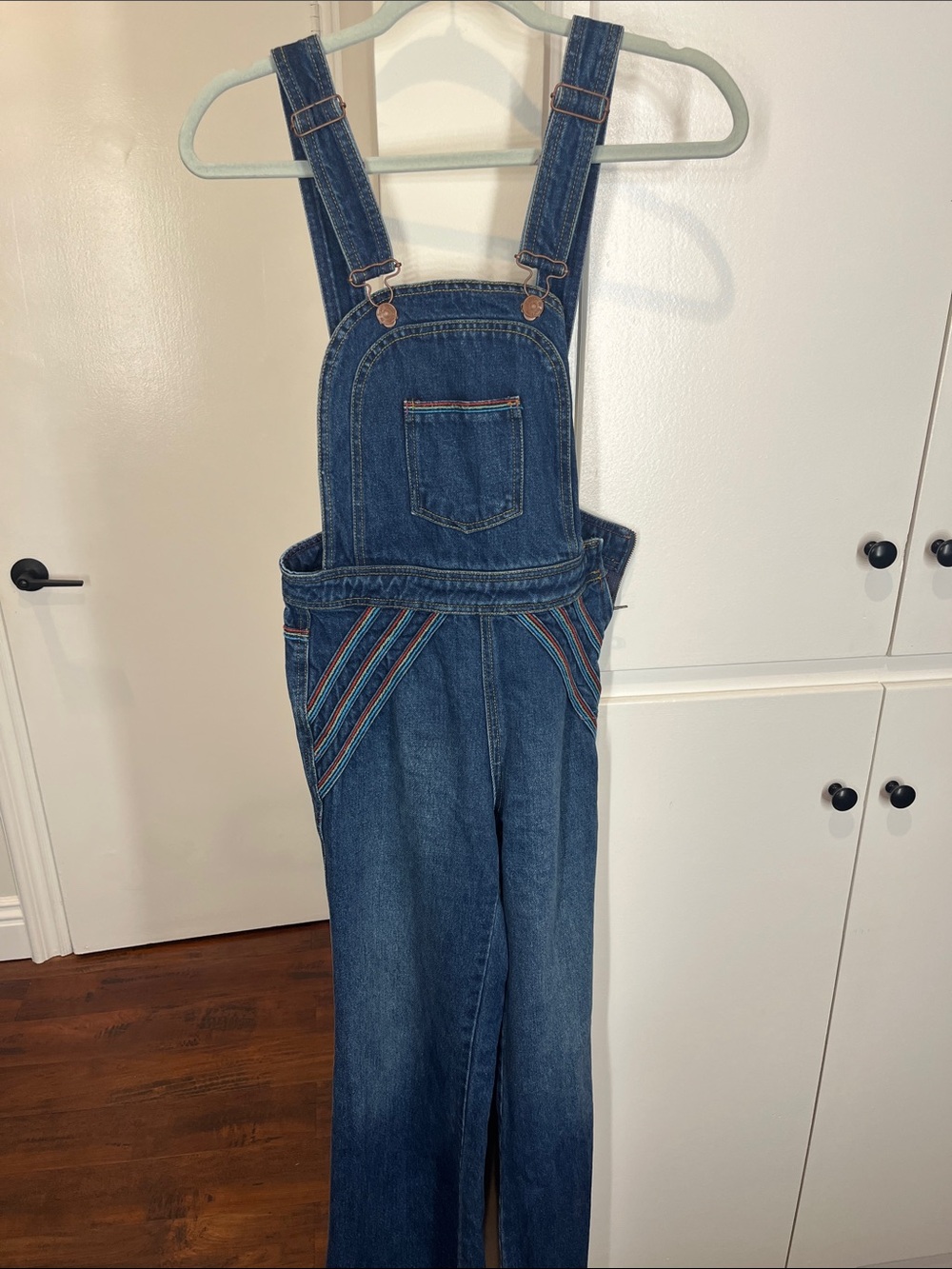 We The Free Blue Denim Overalls with Multicolor Stripe Trim